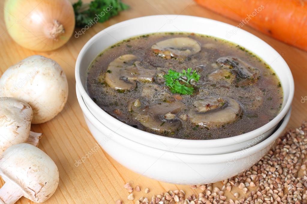 Russian vegetarian soup with buckwheat and mushrooms