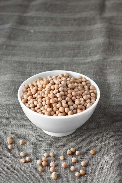 Chickpeas in white ceramic bowl — Stock Photo, Image