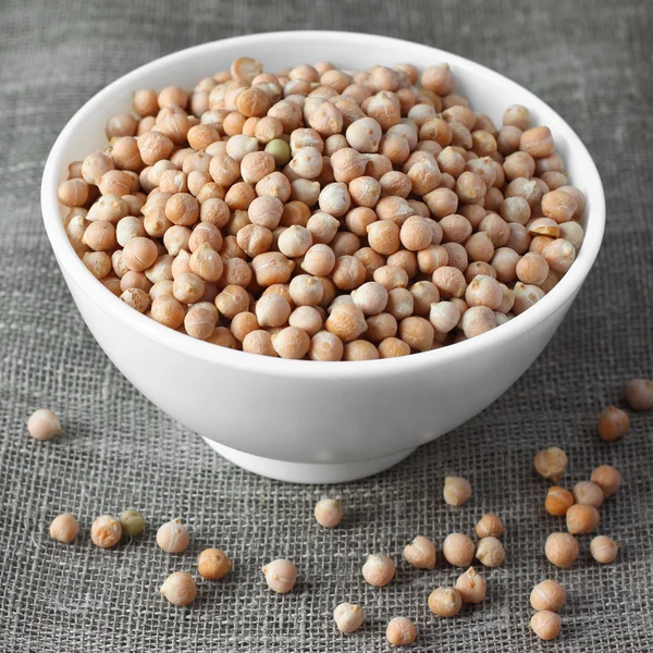 Chickpeas in white ceramic bowl — Stock Photo, Image