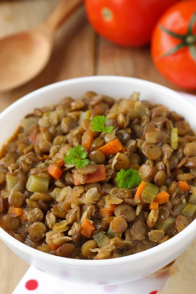 Vegan dinner - green lentils with vegetables — Stock Photo, Image