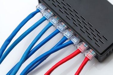LAN network switch with ethernet cables plugged in clipart
