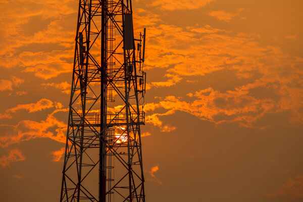 Communication tower during sunset