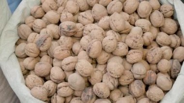 Farmers market. Walnuts in bags