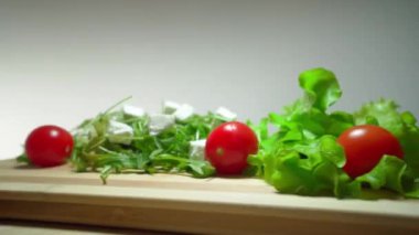 Greek salad ingredients. Lettuce, tomatoes, Greek feta cheese