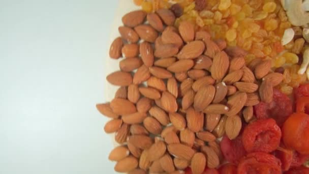 Daily diet of vitamins. Nuts and dried fruits. food from the garden — Stock Video