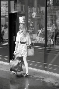 Cityscape in Paris with a shopping girl Opera Avenue Paris