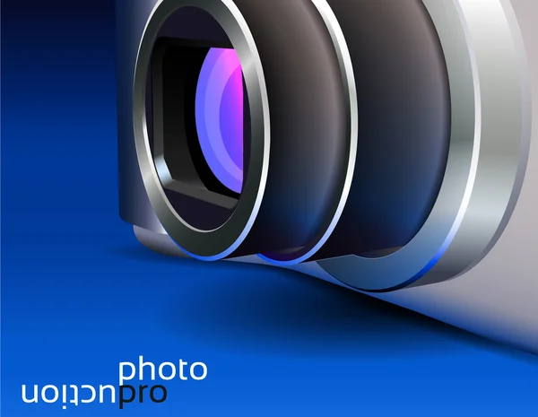 Металева камера на синьому фоні — стокове фото