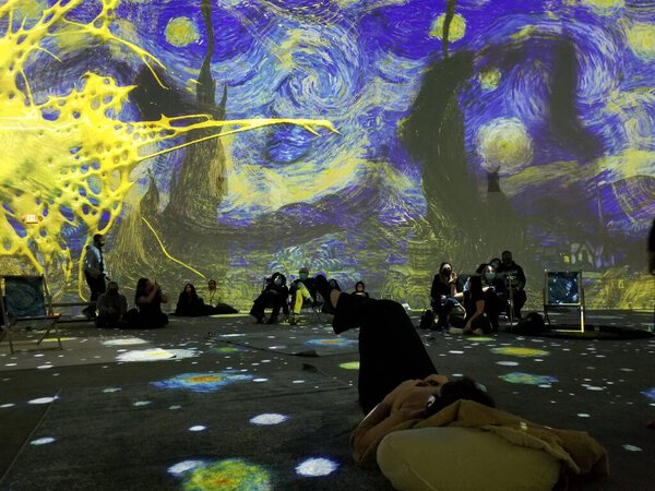 Upper Darby, Pennsylvania, U.S.A - November 28, 2021 - The large colorful projected display of Van Gogh arts on the wall