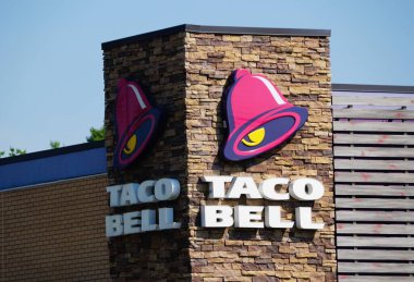 Memphis, Tennessee, U.S - June 23, 2022 - A Taco Bell sign on the building