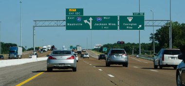 Tennessee, U.S.A - June 23, 2022 - The highway signs towards Interstate 40 East into Nashville and Interstate 240 West into Jackson, Mississippi
