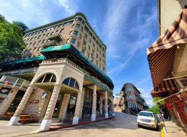 Eureka Springs, Arkansas, U.S.A - June 23, 2022 - The view of shops and historic buildings on the Main Street