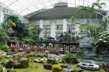 Nashville, Tennessee, U.S.A - June 26, 2022 - The restaurant and beautiful landscape inside of Gaylord Opryland Resort and Convention Center