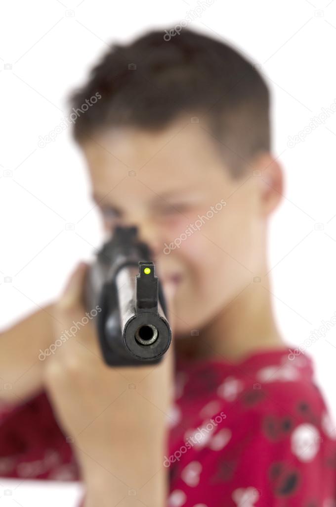 Boy targeting with airgun