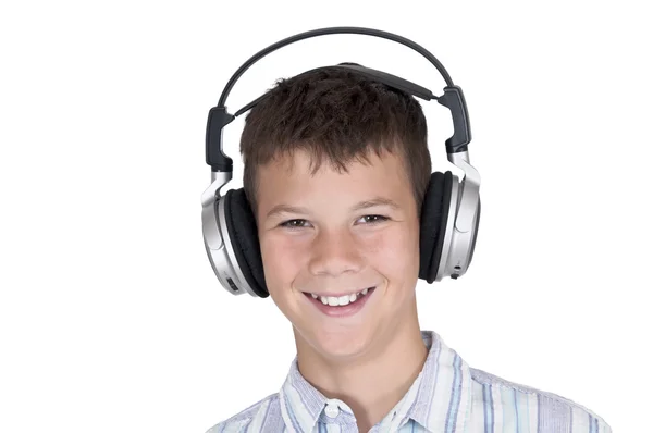 เด็กชายที่มีหูฟังที่มีเส้นทางตัด — ภาพถ่ายสต็อก