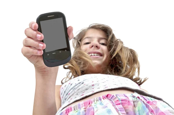 Meisje tonen van mobiele telefoon met uitknippad — Stockfoto