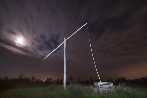 Shadoof and moon by night — Stock Photo, Image