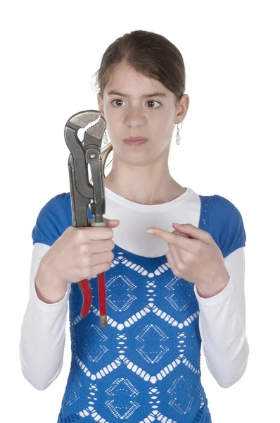 Young woman surprised look to pliers — Stock Photo, Image