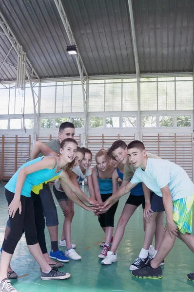 Teens in gymnasium — Stock Photo, Image