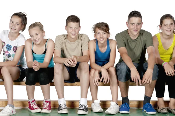 Athlete teens sitting — Stock Photo, Image