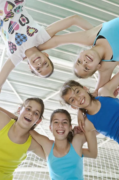 Teens in gymnasium — Stock Photo, Image