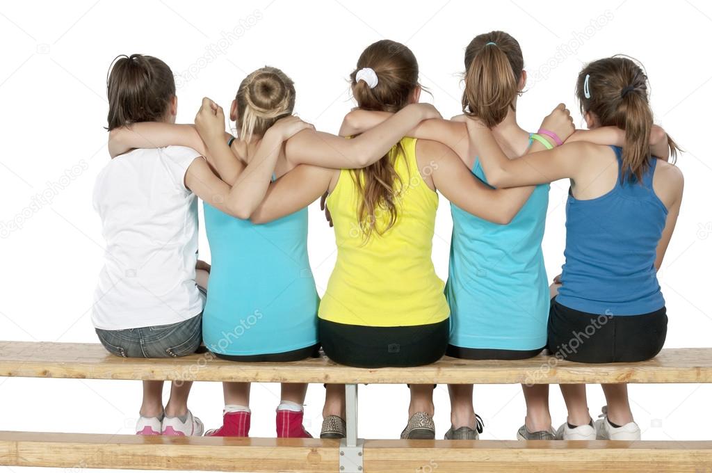 Athlete female teens sitting back