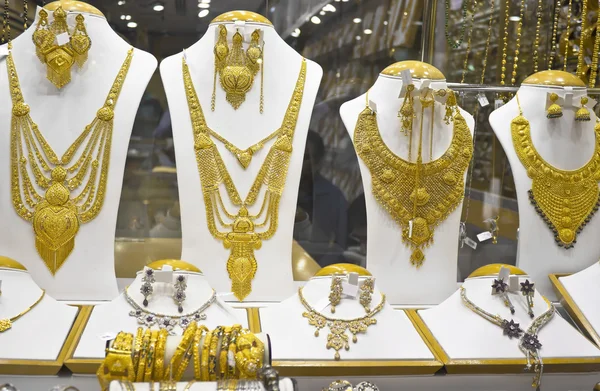 Dubai gold souk market window with jewellery, bracelets and luxury ...