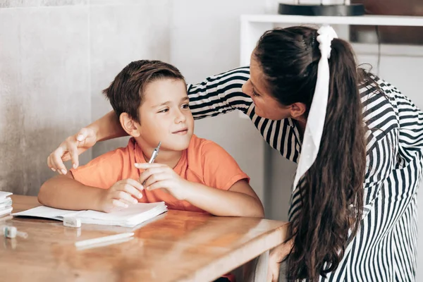 Little School Boy Doing Homework His Mom Cheering Him — Stock Photo, Image