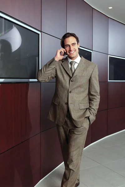 Businessman with mobile phone h — Stock Photo, Image