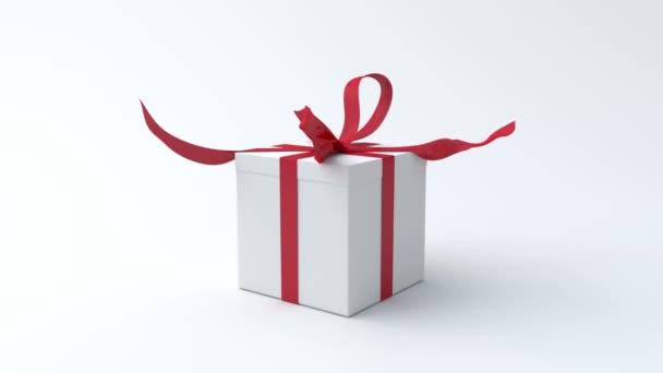Fehér ajándék doboz-val piros szalag megnyitása