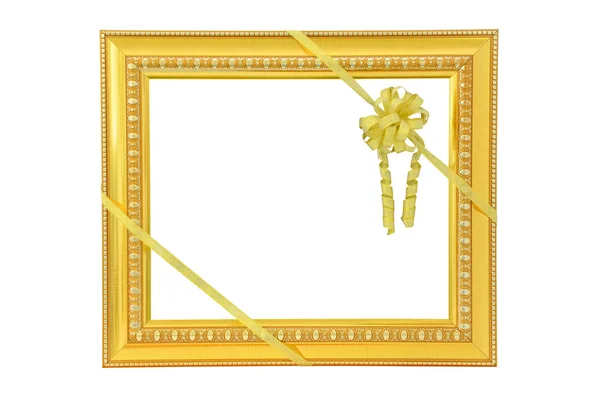 Vintage gold picture frame and golden ribbon with bow isolated — Stock Photo, Image