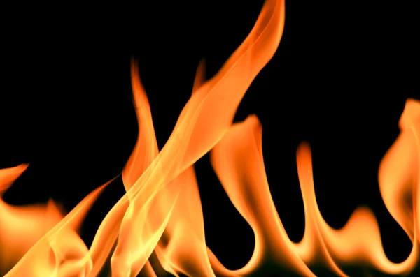 黒い背景の上の炎のフレーム — ストック写真