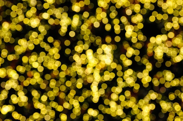 Defocused abstract yellow christmas background — Stock Photo, Image