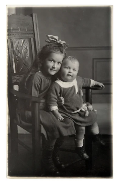 Vintage photo of two sisters — Stock Photo, Image