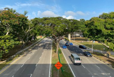 Singapore - Feb 11, 2020. Street of Singapore Downtown. Singapore today revealed lofty goals for becoming a greener country by 2030.