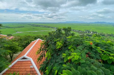 Roof top of brick house with mountain view in Mekong Delta, Vietnam.