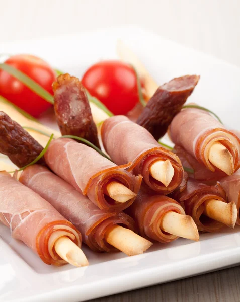 Palitos de pan con jamón ahumado —  Fotos de Stock