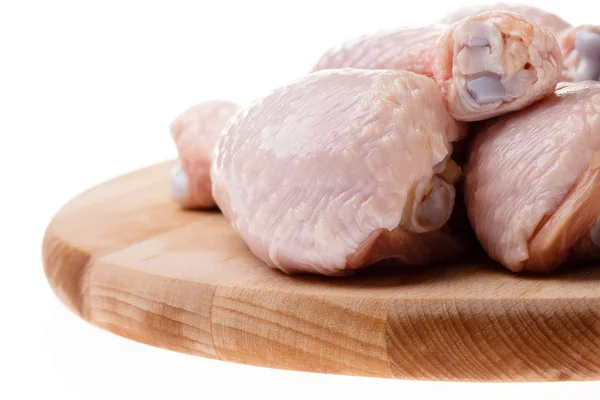 Raw chicken legs on wood — Stock Photo, Image