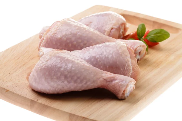 Raw chicken legs on wood — Stock Photo, Image