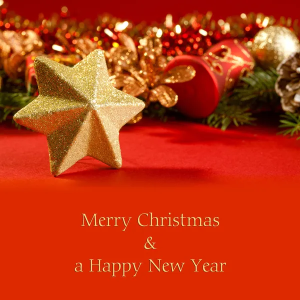 Christmas card with a star and decorations — Stock Photo, Image