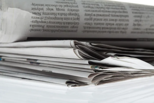 Newspapers folded and stacked concept — Stock Photo, Image