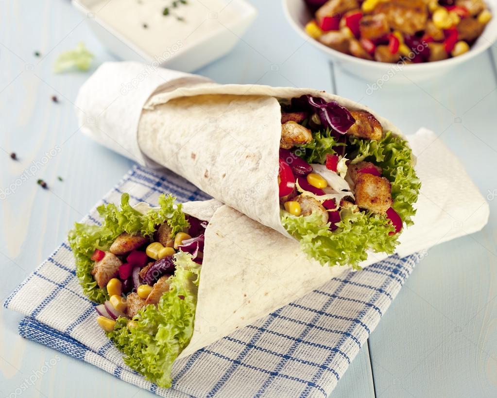 tortilla wraps with meat and vegetables