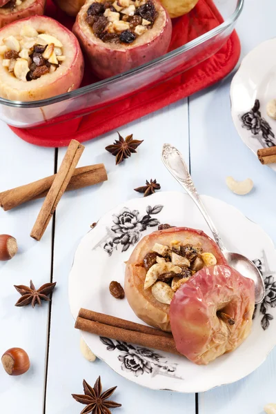 Baked apples with nuts and raisins — Stock Photo, Image