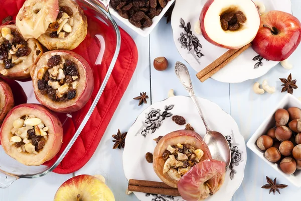 Baked apples with nuts and raisins — Stock Photo, Image
