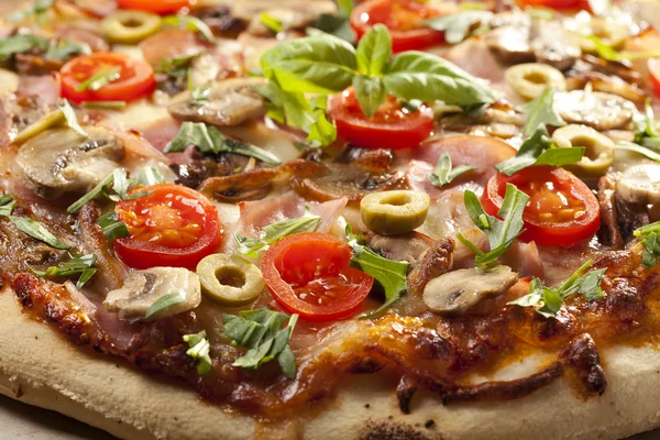 Pizza with ham and mushrooms — Stock Photo, Image