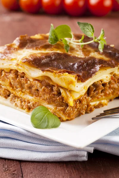 Portion of tasty lasagna on a plate — Stock Photo, Image