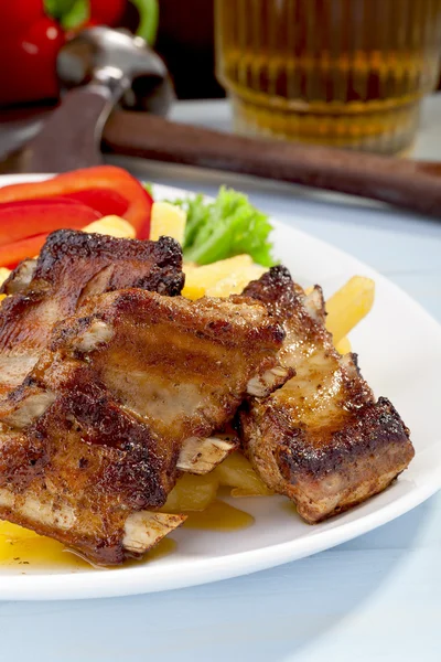 Grilled ribs on plate — Stock Photo, Image