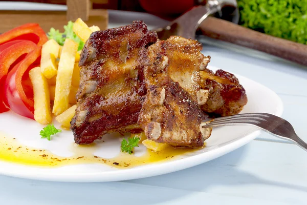 Grilled ribs on plate — Stock Photo, Image