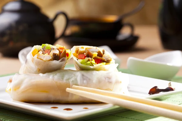 Portion of spring rolls on plate — Stock Photo, Image