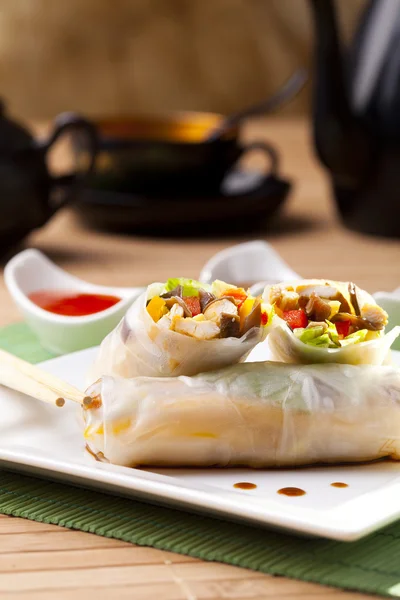 Portion of spring rolls on plate — Stock Photo, Image