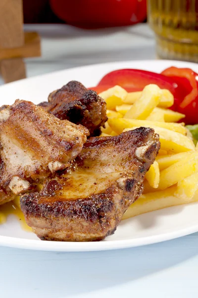 Grilled ribs on plate — Stock Photo, Image